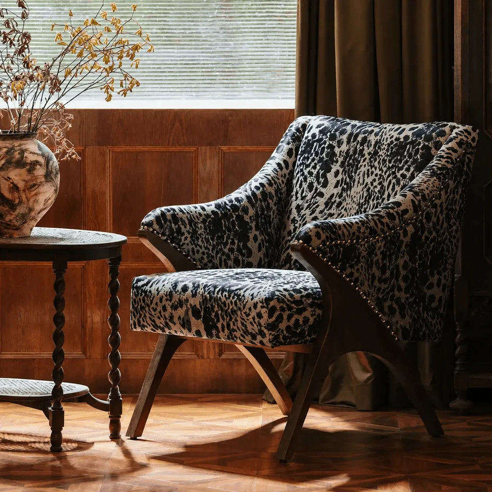 Sculptural Leopard Wingback Chair Series with Exposed Wood Frame and Rich Textures