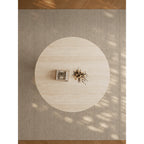 Sculptural Round Burlwood Dining Table with Stone Top and Arched Base