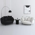 Sculptural Round Sofa with Layered Cushions and Slim Metal Legs
