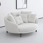 Sculptural Round Sofa with Layered Cushions and Slim Metal Legs