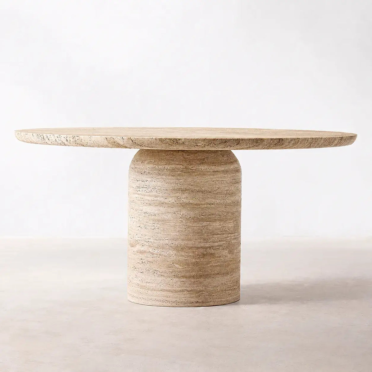 Sculptural Round Travertine Dining Table with Soft Beige Stone Pedestal Main Product Image