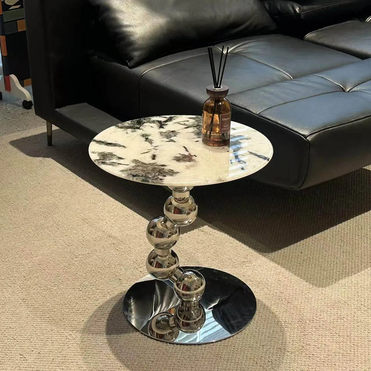 Sculptural Sintered Stone Side Table with Mirrored Metal Base