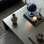 Sculptural Stainless Steel Coffee Table with Rounded Edges for Modern Living Rooms