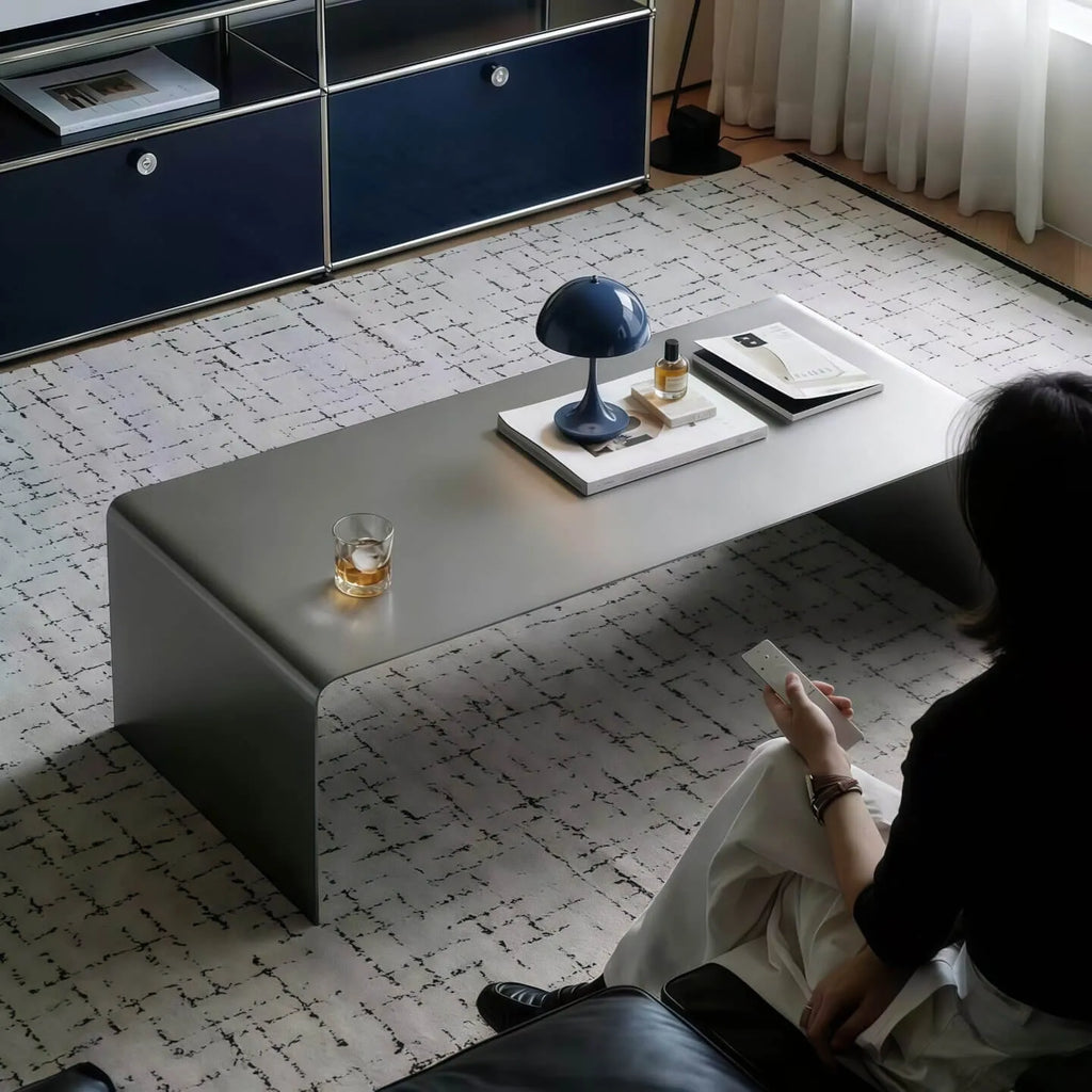 Sculptural Stainless Steel Coffee Table with Rounded Edges for Modern Living Rooms