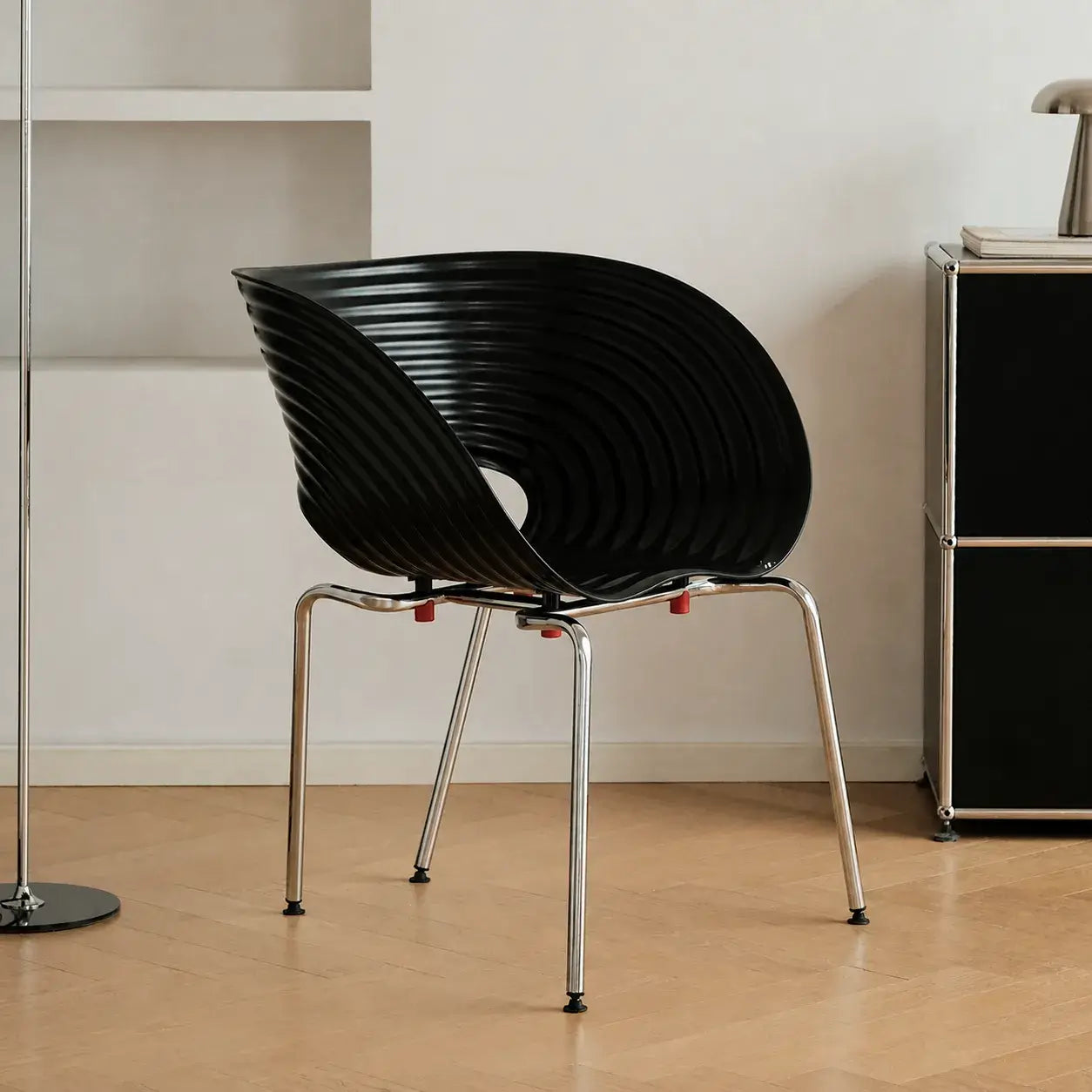 Sculptural Tom Vac Chair With Ribbed Curves and Ergonomic Metal Base
