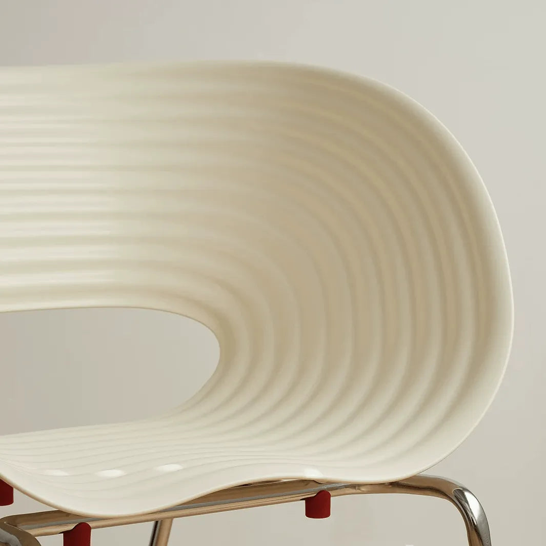 Sculptural Tom Vac Chair With Ribbed Curves and Ergonomic Metal Base