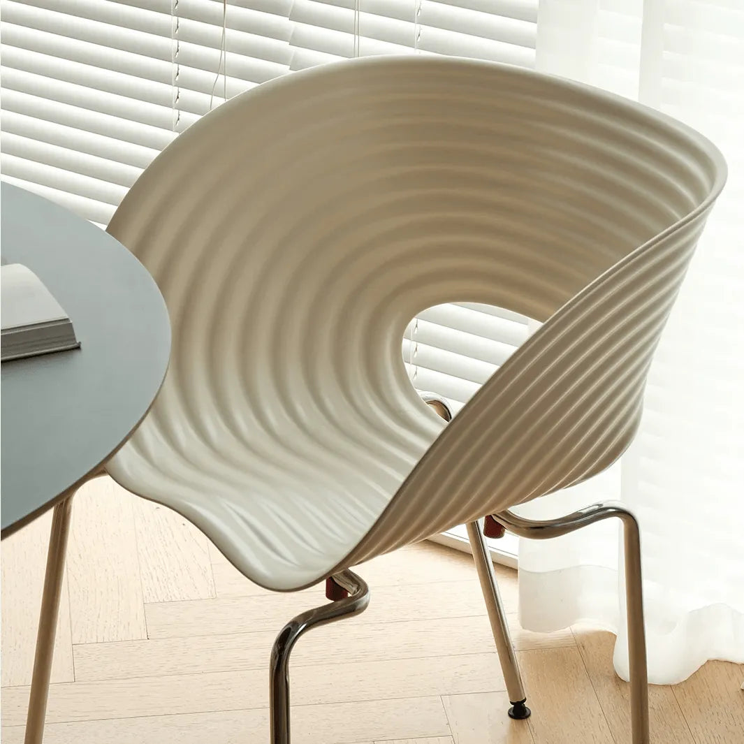 Sculptural Tom Vac Chair With Ribbed Curves and Ergonomic Metal Base