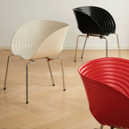Sculptural Tom Vac Chair With Ribbed Curves and Ergonomic Metal Base
