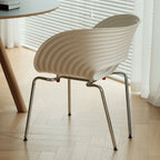 Sculptural Tom Vac Chair With Ribbed Curves and Ergonomic Metal Base