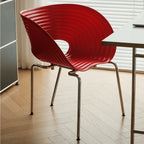 Sculptural Tom Vac Chair With Ribbed Curves and Ergonomic Metal Base