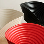 Sculptural Tom Vac Chair With Ribbed Curves and Ergonomic Metal Base