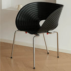 Sculptural Tom Vac Chair With Ribbed Curves and Ergonomic Metal Base