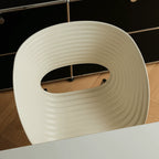 Sculptural Tom Vac Chair With Ribbed Curves and Ergonomic Metal Base