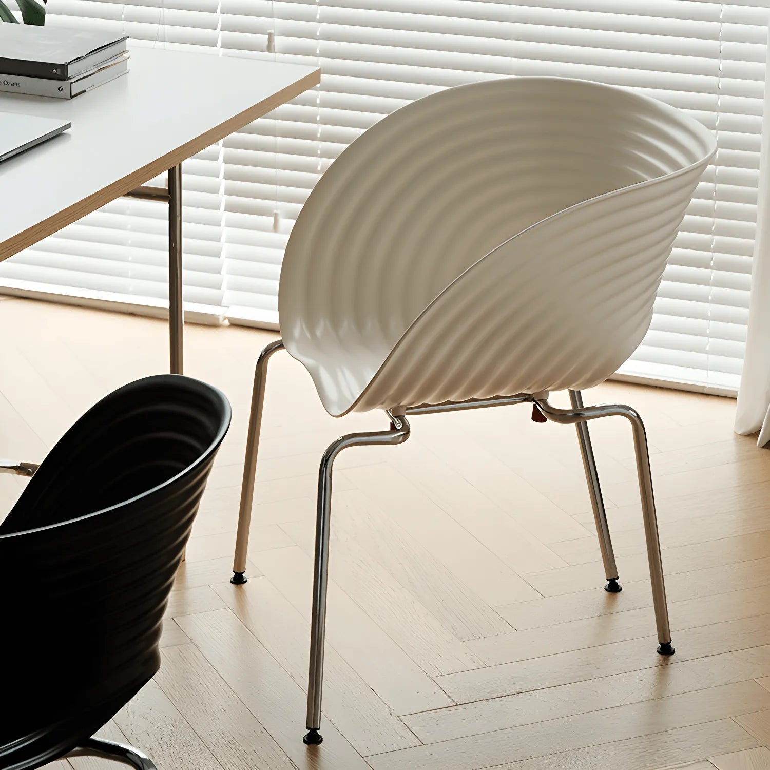 Sculptural Tom Vac Chair With Ribbed Curves and Ergonomic Metal Base