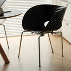 Sculptural Tom Vac Chair With Ribbed Curves and Ergonomic Metal Base