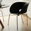 Sculptural Tom Vac Chair With Ribbed Curves and Ergonomic Metal Base