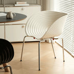 Sculptural Tom Vac Chair With Ribbed Curves and Ergonomic Metal Base Main Product Image