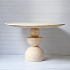 Sculptural Travertine Dining Table With Warm Beige Stone and Pedestal Base