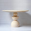 Sculptural Travertine Dining Table With Warm Beige Stone and Pedestal Base