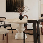 Sculptural Travertine Dining Table With Warm Beige Stone and Pedestal Base
