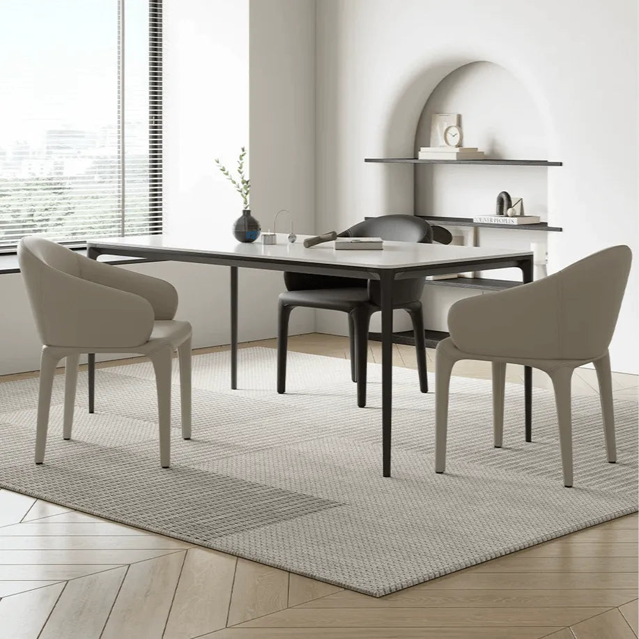 Sculptural Upholstered Dining Chair Series with Curved Arms and Slender Legs