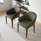 Sculptural Upholstered Dining Chair Series with Curved Arms and Slender Legs