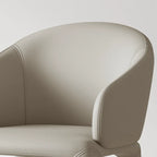 Sculptural Upholstered Dining Chair Series with Curved Arms and Slender Legs