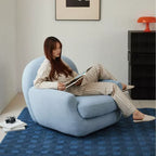 Sculptural Velvet Accent Chair With Swivel Base and Embrace Comfort