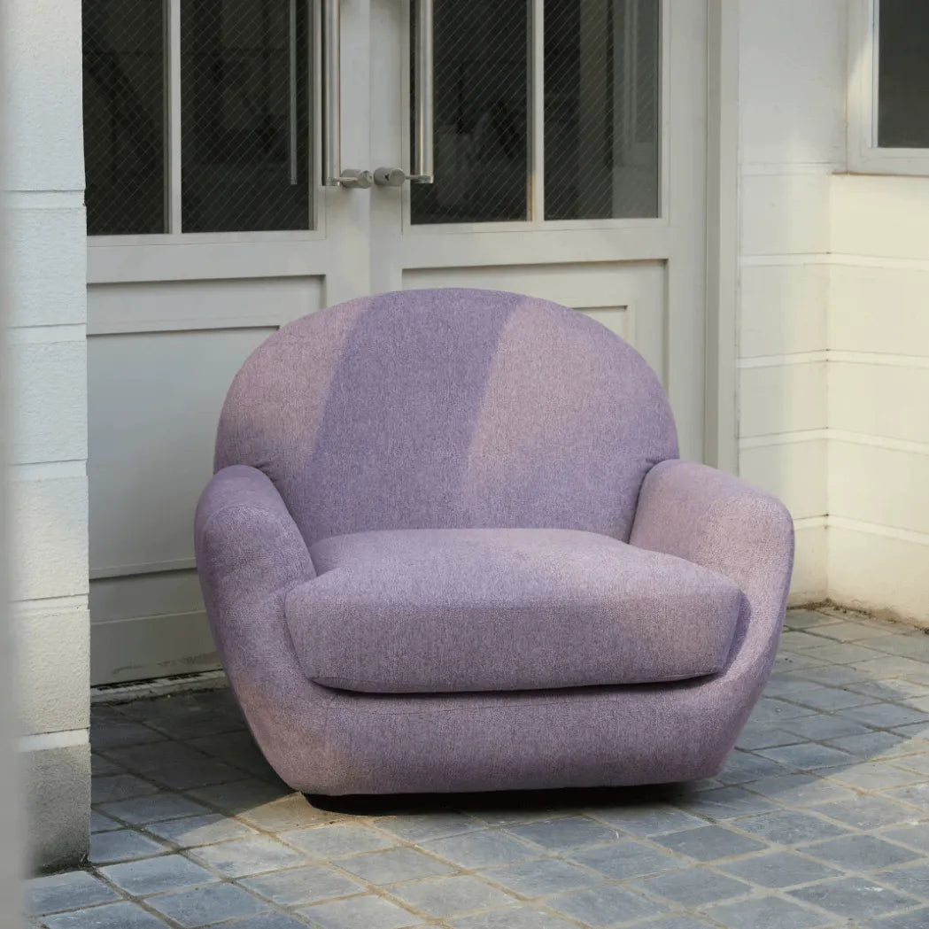 Sculptural Velvet Accent Chair With Swivel Base and Embrace Comfort