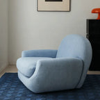 Sculptural Velvet Accent Chair With Swivel Base and Embrace Comfort