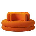 Sculptural Velvet Round Sofa with Wraparound Back for Lounge Spaces
