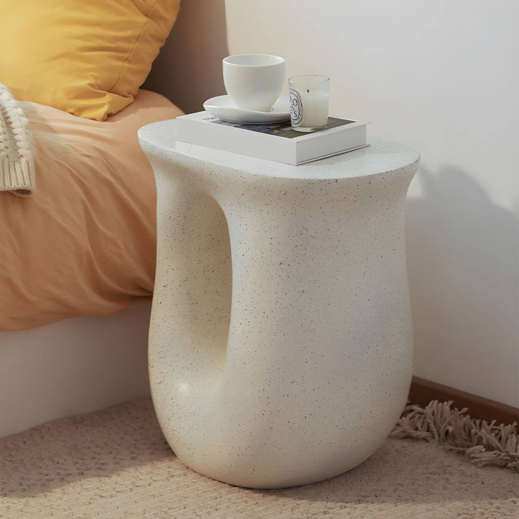 Sculptural White Concrete Side Table with Organic Curves and Elliptical Cutout