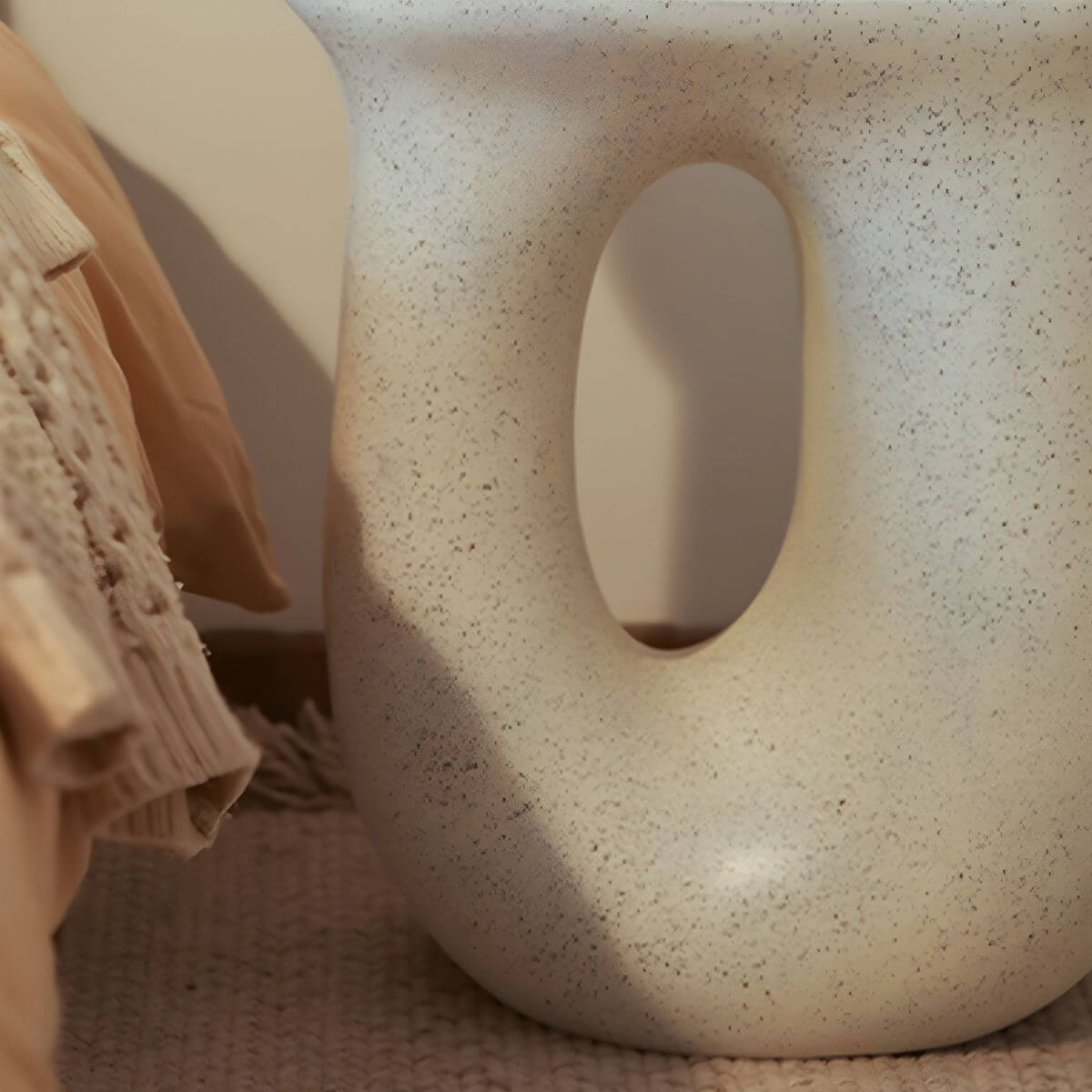 Sculptural White Concrete Side Table with Organic Curves and Elliptical Cutout