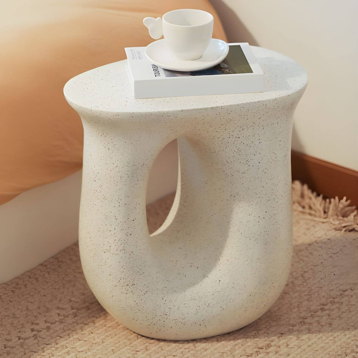 Sculptural White Concrete Side Table with Organic Curves and Elliptical Cutout