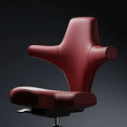 Sculptural Wine Red Saddle Office Chair With Winged Arms and Polished Base