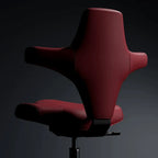 Sculptural Wine Red Saddle Office Chair With Winged Arms and Polished Base