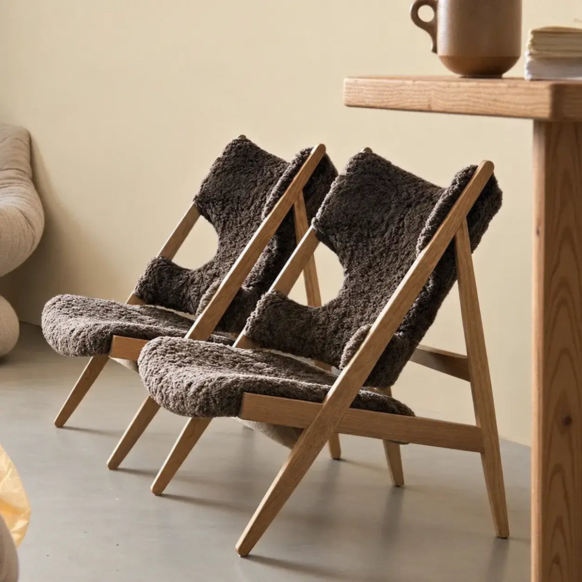 Sculptural Wood Frame Knitting Sheepskin Lounge Chair for Relaxed Living