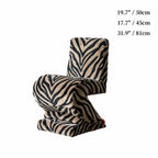 Sculptural Zigzag Chair Series With Zebra Print Textures and Soft Curved Upholstery Dimensions