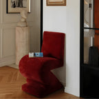 Sculptural Zigzag Chair Series With Zebra Print Textures and Soft Curved Upholstery