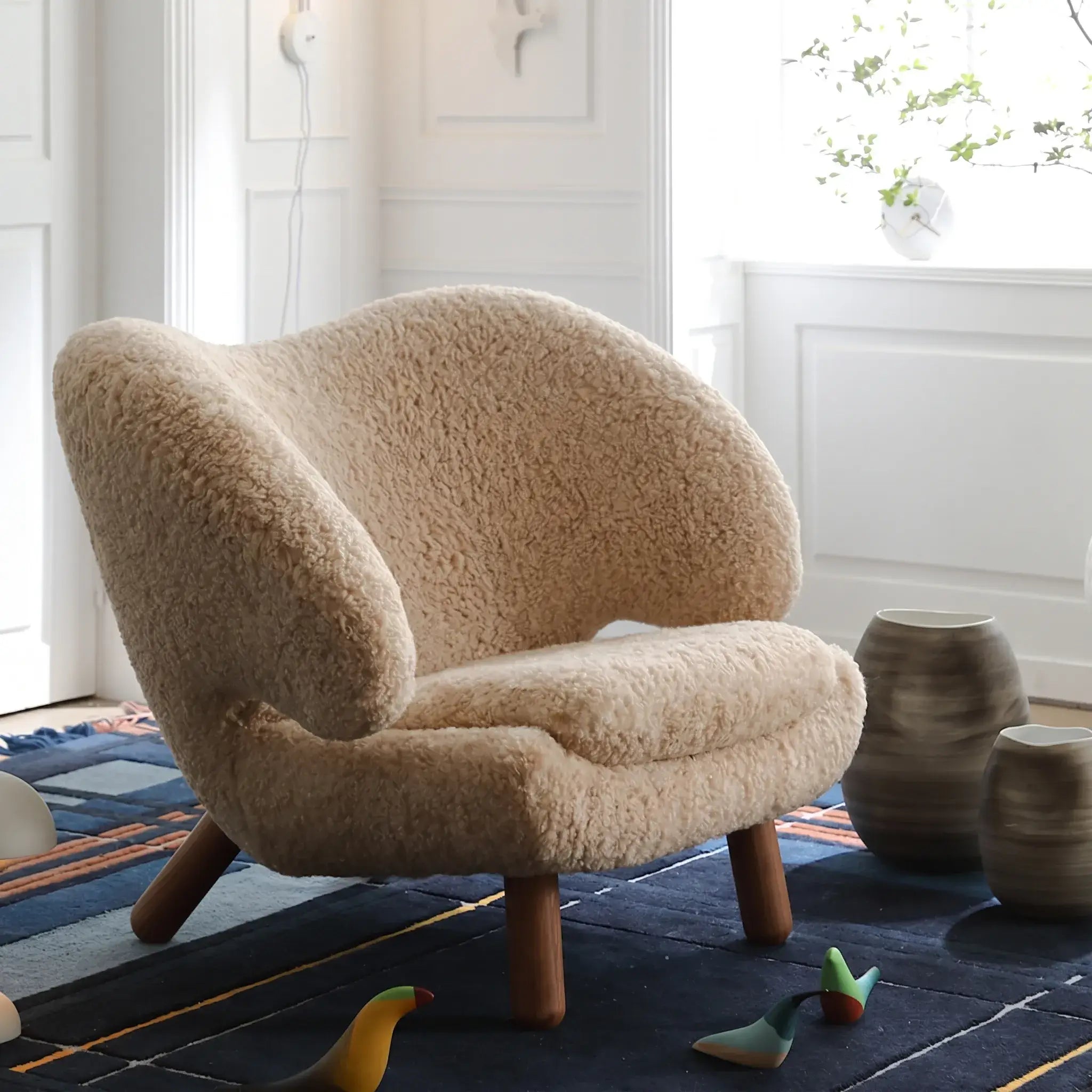 Shearling Pelican Chair Series With Walnut Legs and Embrace Lounge Silhouette