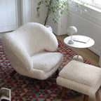 Shearling Pelican Chair Series With Walnut Legs and Embrace Lounge Silhouette