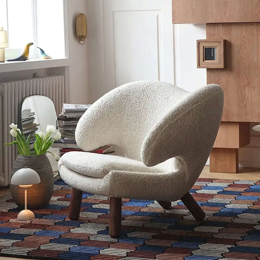 Shearling Pelican Chair Series With Walnut Legs and Embrace Lounge Silhouette