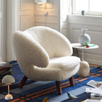 Shearling Pelican Chair Series With Walnut Legs and Embrace Lounge Silhouette