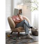 Shearling Pelican Chair Series With Walnut Legs and Embrace Lounge Silhouette