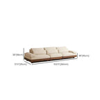 Cream Art Deco floor sofa with pillow back, pillow top arms, slipcover, and multiple pillows for seating 2 to 4 people dimensions