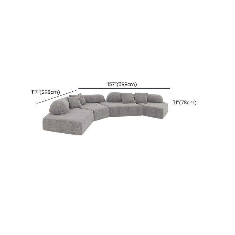 Bow shaped corner sectional from the side