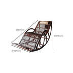 Cozy reading nook with a brown wicker rocking armchair