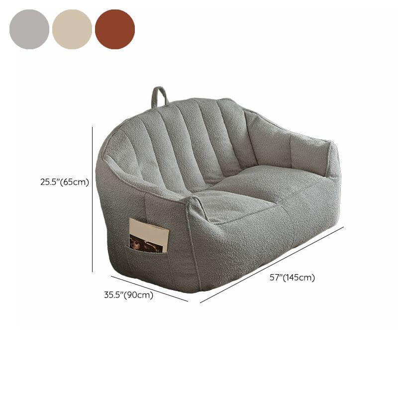 Relaxing orange bean bag chair in solid color