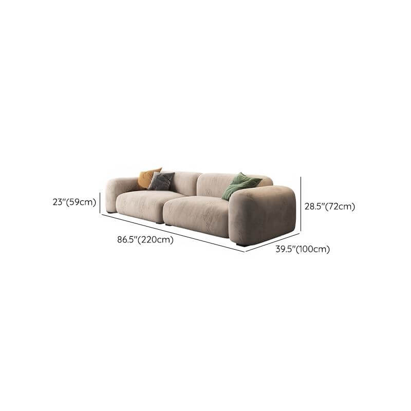 Comfortable grey sofa with plush cushions
