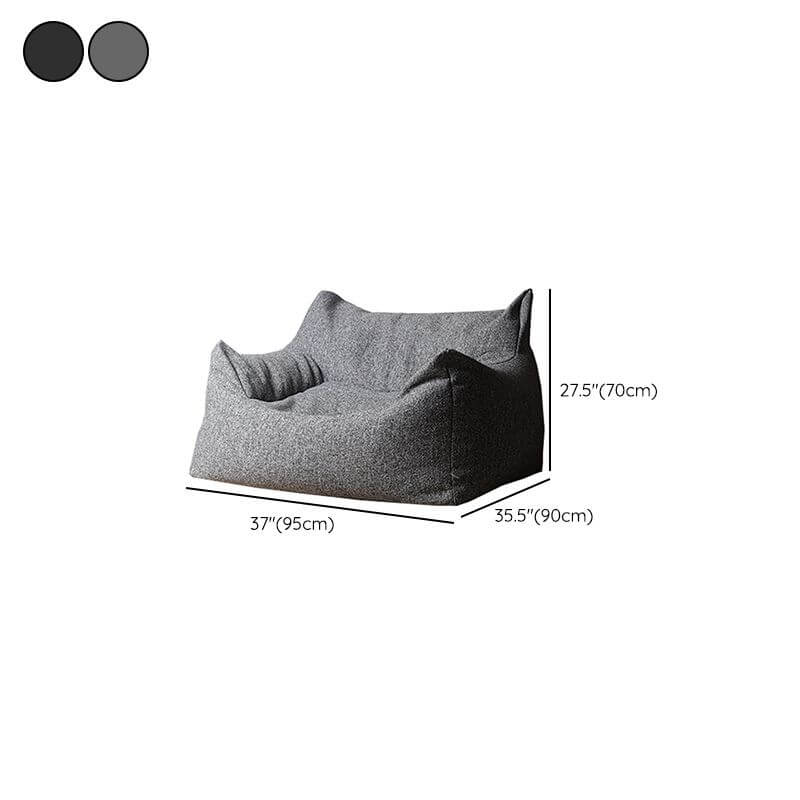 Cozy bean bag chair with a book on it